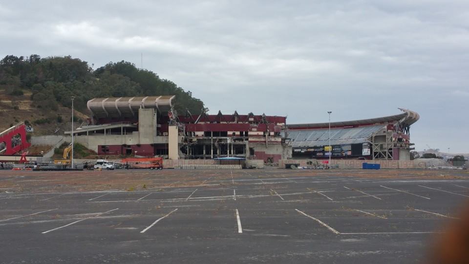Photo of an exterior view of the demolition of Candlestick Park. 