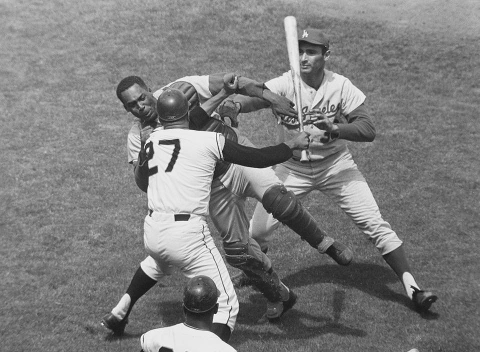 Photo of Juan Marichal of the Giants attacking pitcher John Roseboro of the Los Angeles Dodgers. 
