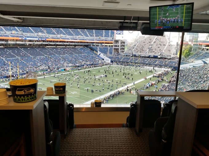 Interior photo of a suite at CenturyLink Field during a Seattle Seahawks game.