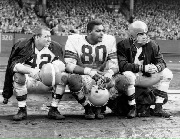 Cleveland Browns players Otto Graham with teammates Len Ford and Tom James.