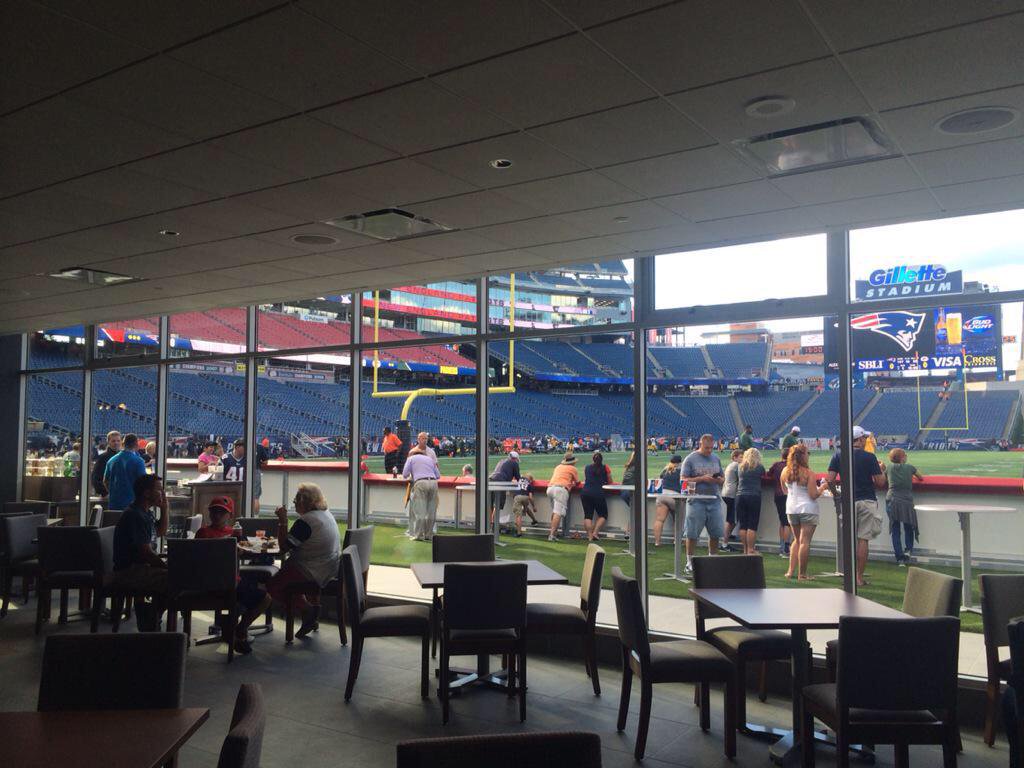 Interior photo of the Optum Club Lounge at Gillette Stadium, home of the New England Patriots.