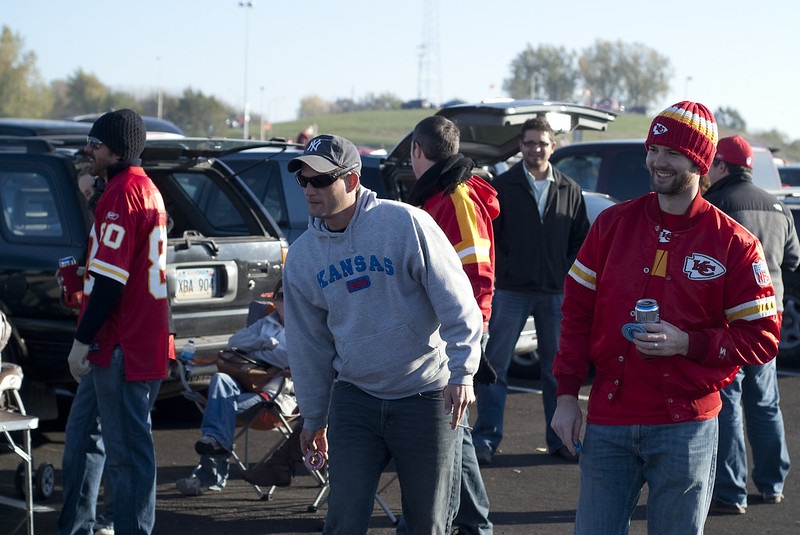 Photo of Kansas City Chiefs fans tailgating outside of Arrowhead Stadium.