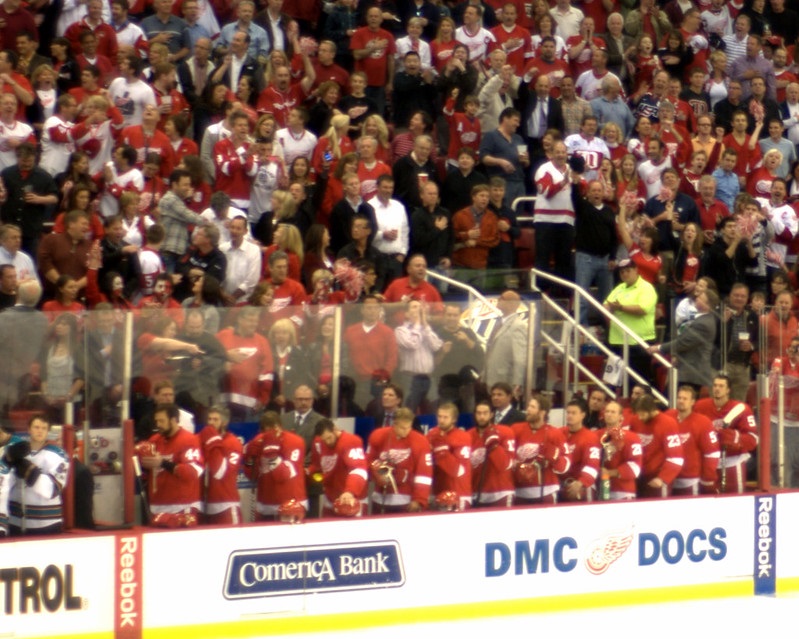 Photo of Detroit Red Wings fans during the national anthem at Joe Louis Arena.