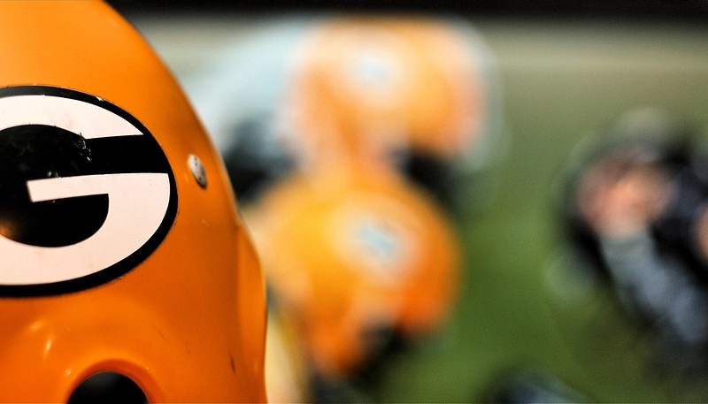 Photo of a yellow Green Bay Packers helmet.