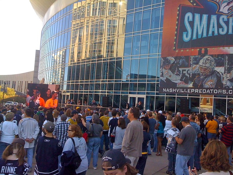 Photo of a large crowd of hockey fans standing outside of Bridgestone Arena.