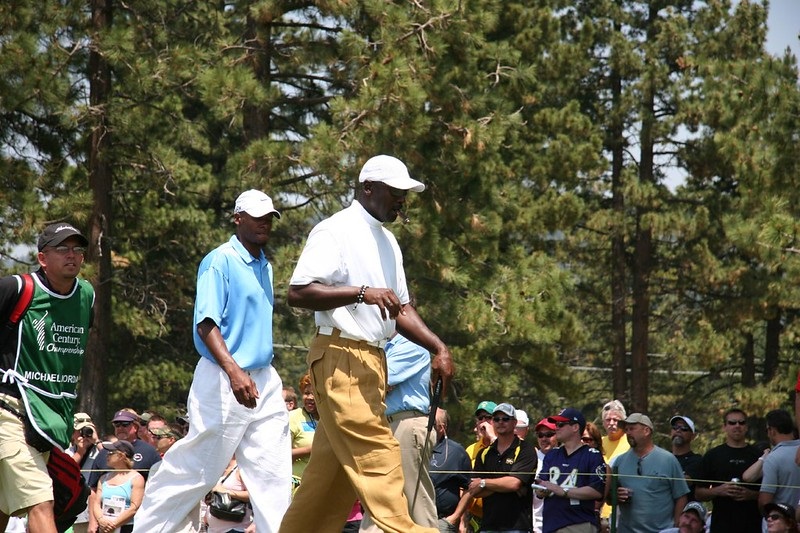 Photo of Michael Jordan playing golf with Ray Allen.