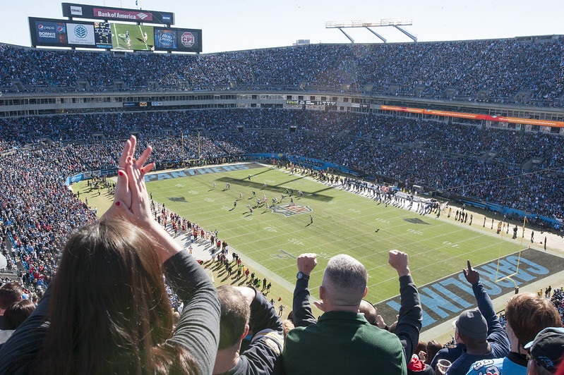 Photo of Carolina Panthers fans cheering at Bank of America Stadium.