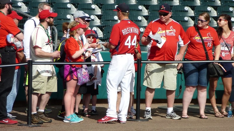 Photo of Trevor Rosenthal of the St. Louis Cardinals signing autographs during batting practice.