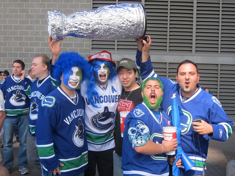 Photo of Vancouver Canucks fans acting rowdy outside of Rogers Arena.