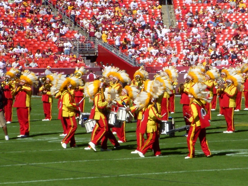 Photo of the Washington Redskins marching band playing on the field.