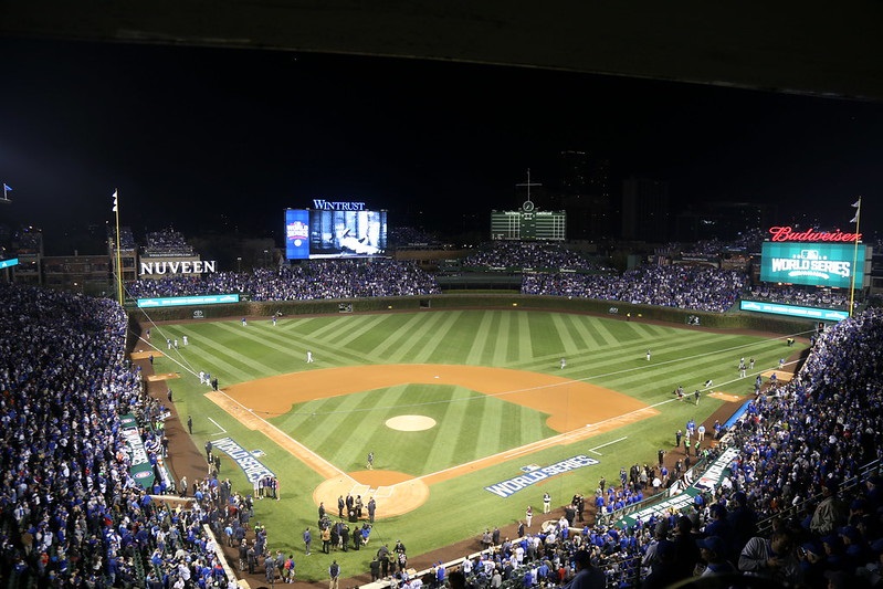 Photo of a Chicago Cubs night game at Wrigley Field.