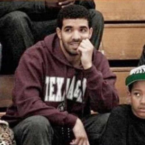 Photo of Drake in a Texas A&M sweatshirt.