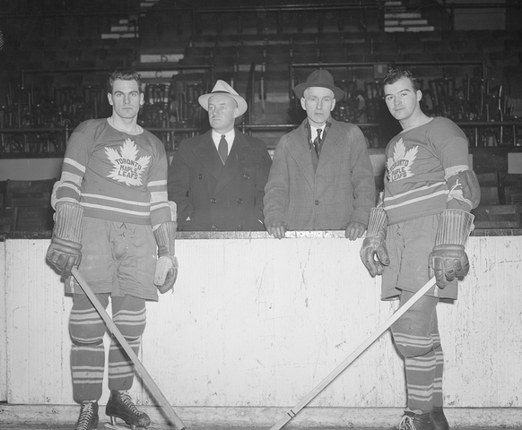Photo of Toronto Maple Leafs founder Conn Smythe with Dick Irvin, Syl Apps and Gordie Drillon.