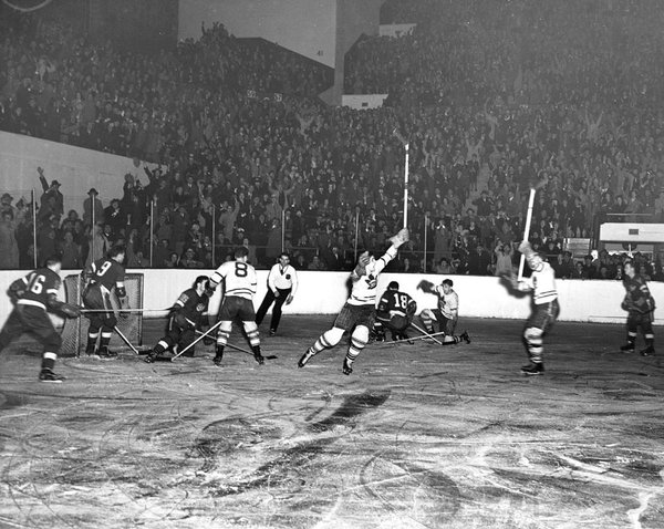 Black and white photo of a Toronto Maple Leafs vs. Detroit Red Wings game.