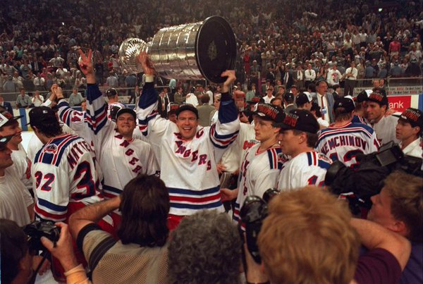 Photo of Mark Messier of the New York Rangers hoisting the Stanley Cup.