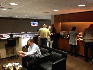 Interior photo of a suite at the Mercedes-Benz Superdome during a New Orleans Saints game.
