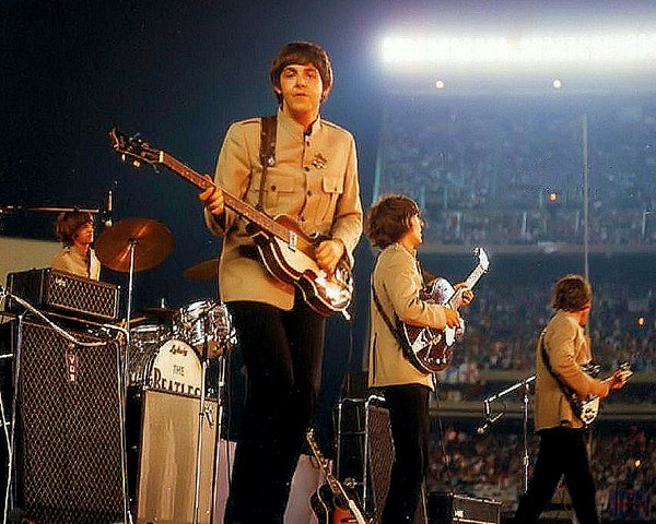 Photo of the Beatles playing Shea Stadium in 1965.