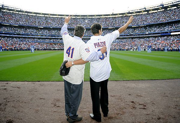 Photo of Tom Seaver and Mike Piazza saying goodbye to Shea Stadium and New York Mets fans during the final game at Shea Stadium.