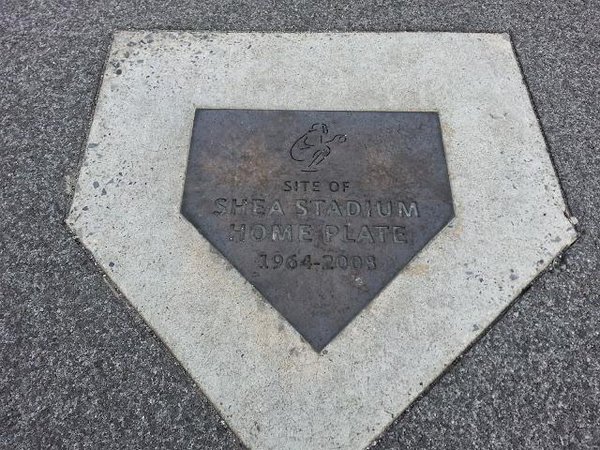 Photo of the Shea Stadium home plate memorial in the Citi Field parking lot.