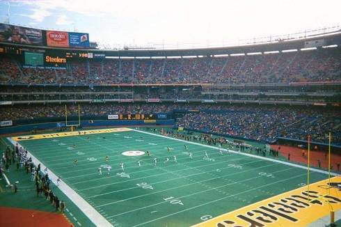 Panoramic photo of the Three Rivers Stadium playing field during a Pittsburgh Steelers home game.