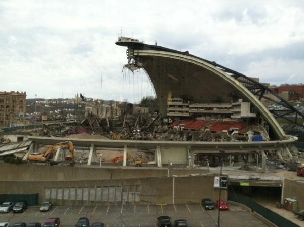 An exterior photo of the Civic Arena demolition. 