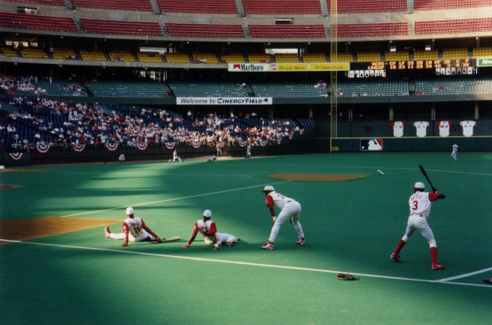 Cincinnati Reds players warming up at Cinergy Field during the 1990's.