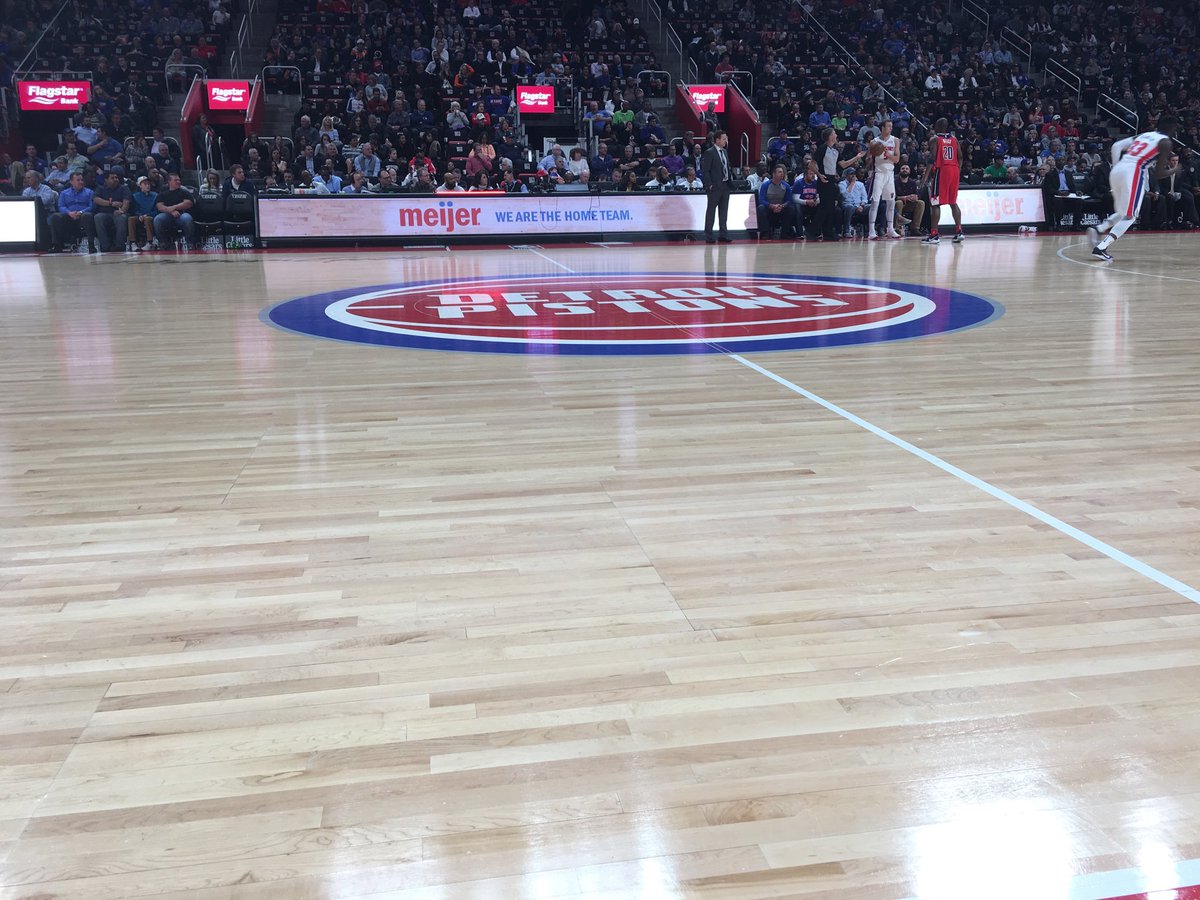 View from the courtside seats at Little Caesars Arena during a Detroit Pistons game.