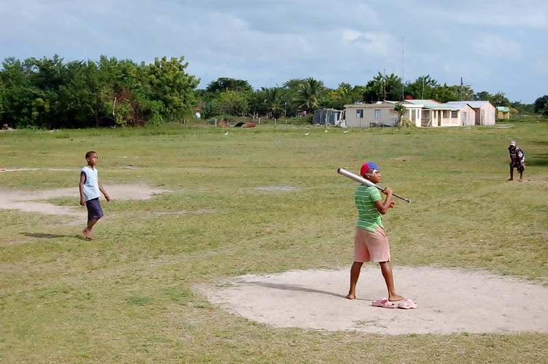 Photo of young boys playing baseball in the Dominican Republic.
