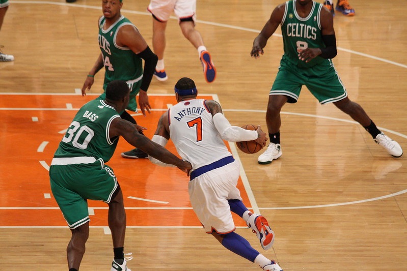 Photo of Carmelo Anthony driving to the basket versus the Boston Celtics.