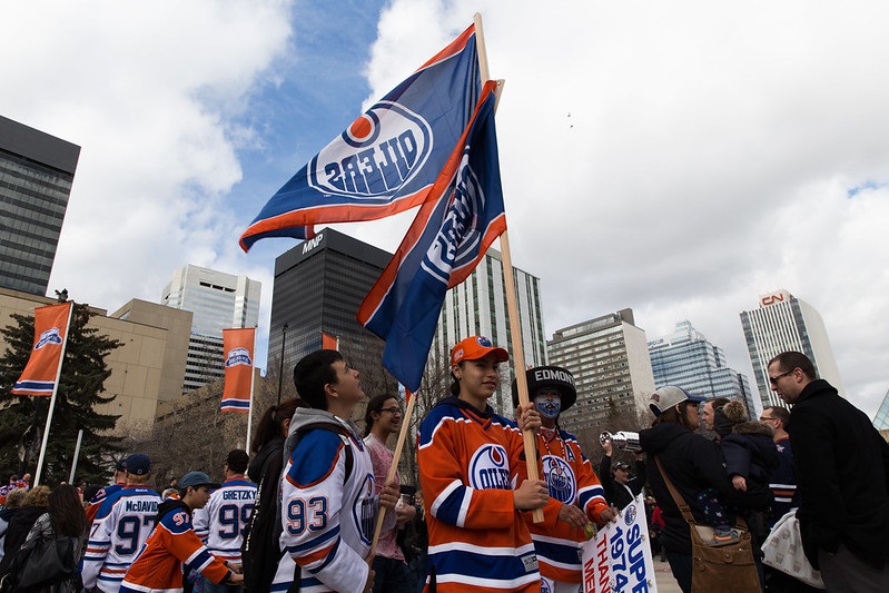 Photo of Edmonton Oilers fans walking in downtown Edmonton, Alberta.