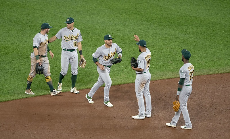 Photo of Oakland Athletics players on the field.
