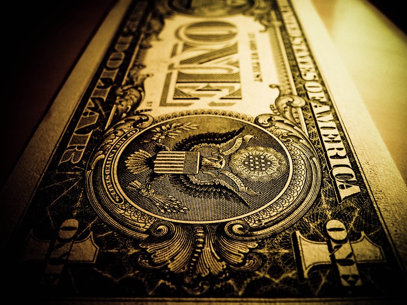 Black and white stock photo of a one dollar bill.
