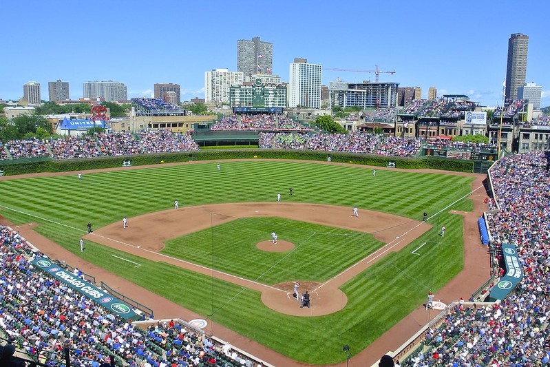 Photo of a Chicago Cubs day game at Wrigley Field.