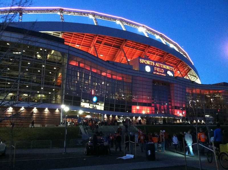 Exterior photo of Sports Authority Field at Mile High taken at night. Home of the Denver Broncos.