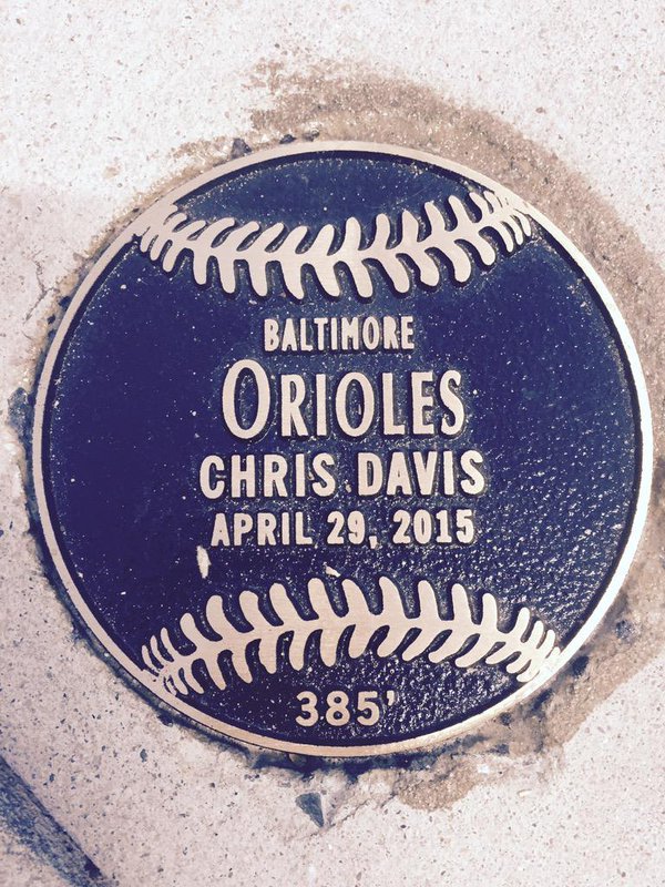 Photo of Chris Davis home run plaque on Eutaw Street outside of Camden Yards.