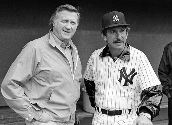 Photo of New York Yankees owner George Steinbrenner with Yankees manager Billy Martin.