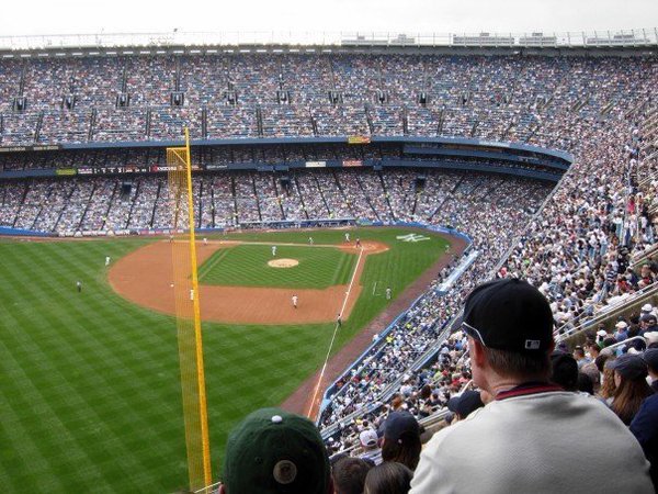 Photo of an obstructed view of the playing field from upper left field at old Yankee Stadium. 