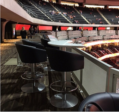 Photo of the loge tables on the PCL Loge Level of Rogers Place in Edmonton, Alberta.