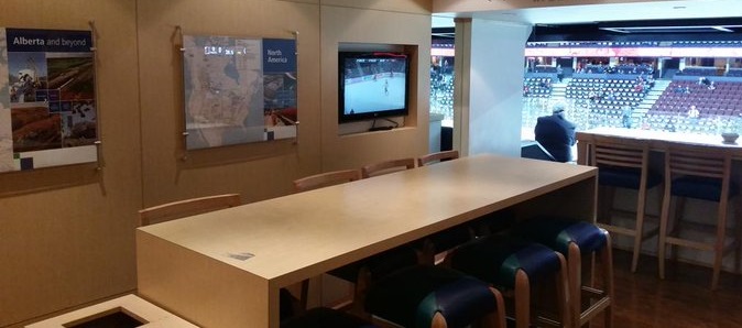 Interior photo of a suite at the Scotiabank Saddledome during a Calgary Flames game.