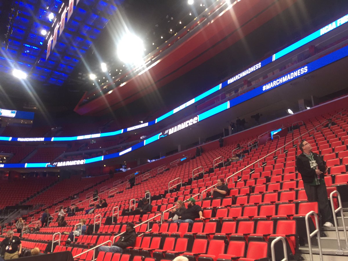 Photo of the red seats at Little Caesars Arena. 